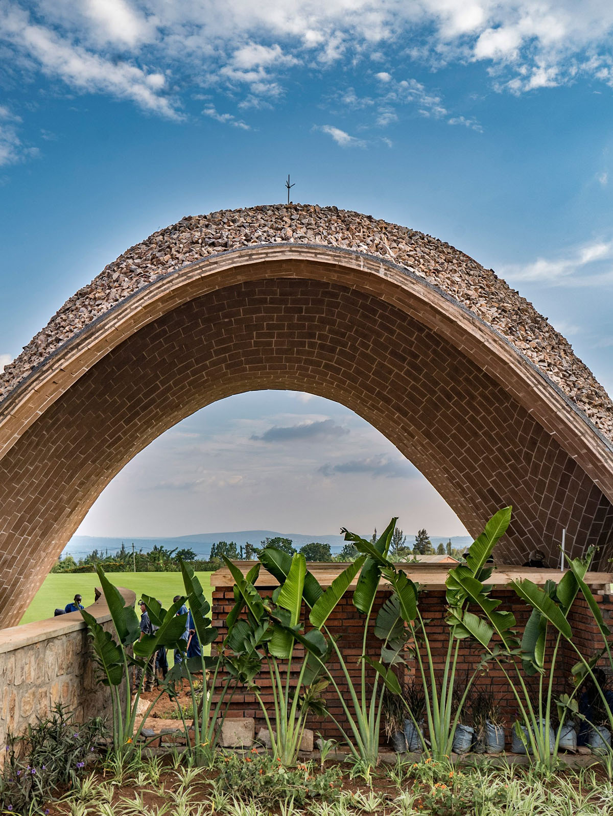 Light Earth Designs' parabolic Cricket Stadium addresses to cherished hilly topography of Rwanda