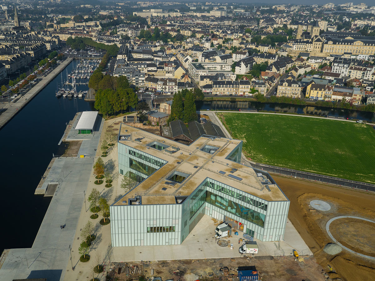 X-shaped Library designed by OMA and Barcode Architects opened to the public in Normandy