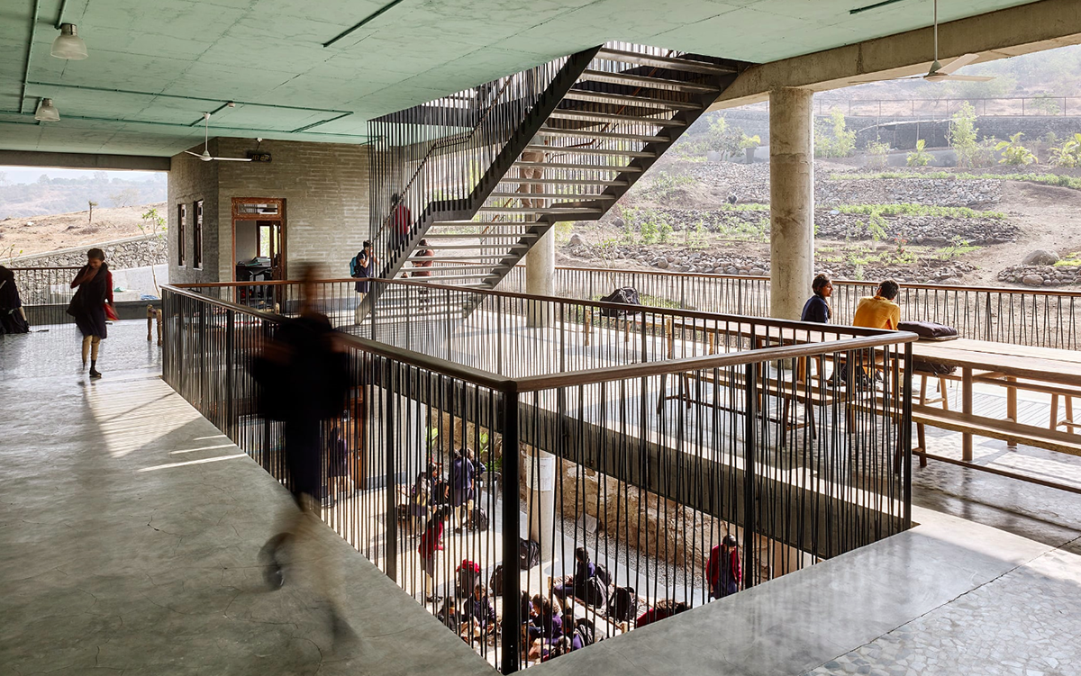 Avasara Academy, resembling an unfinished structure, educates young women in the moorland of Pune