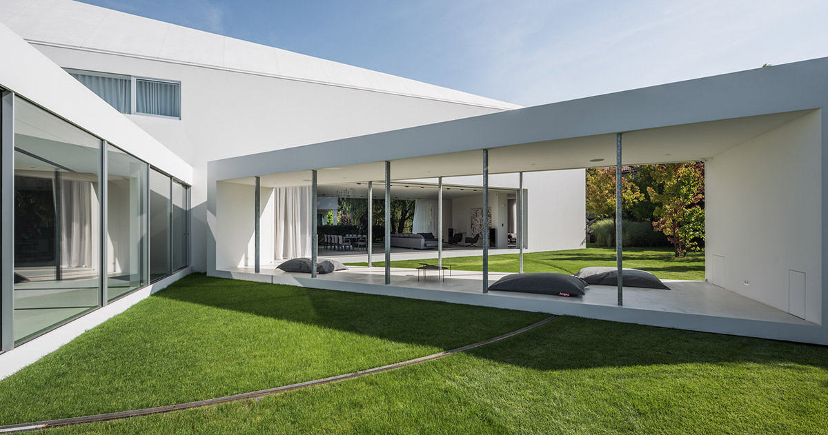 Movements of sun define the form of this protruding house designed by KWK Promes in Poland