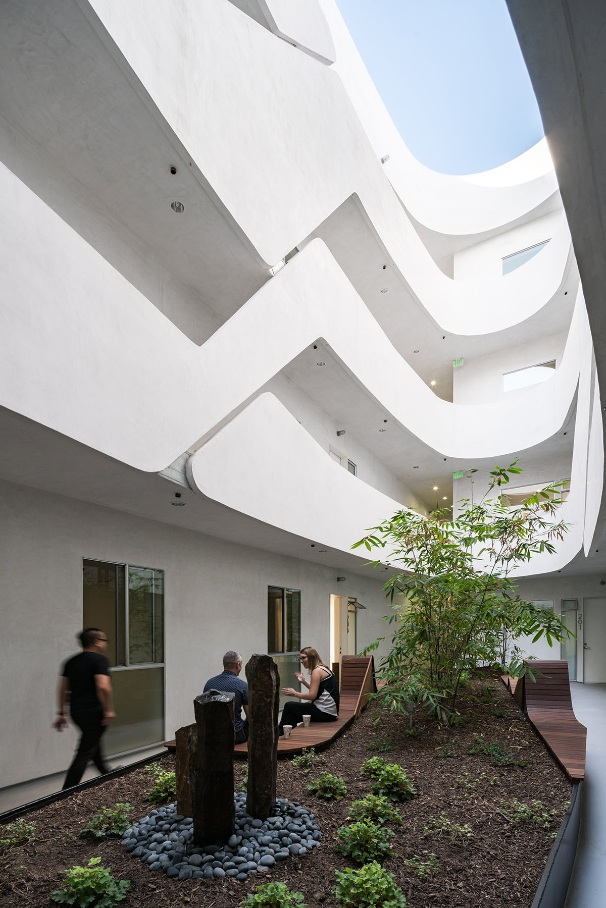 LOHA slightly pushes four sides of this apartment inward to adapt to its tight plot in Los Angeles