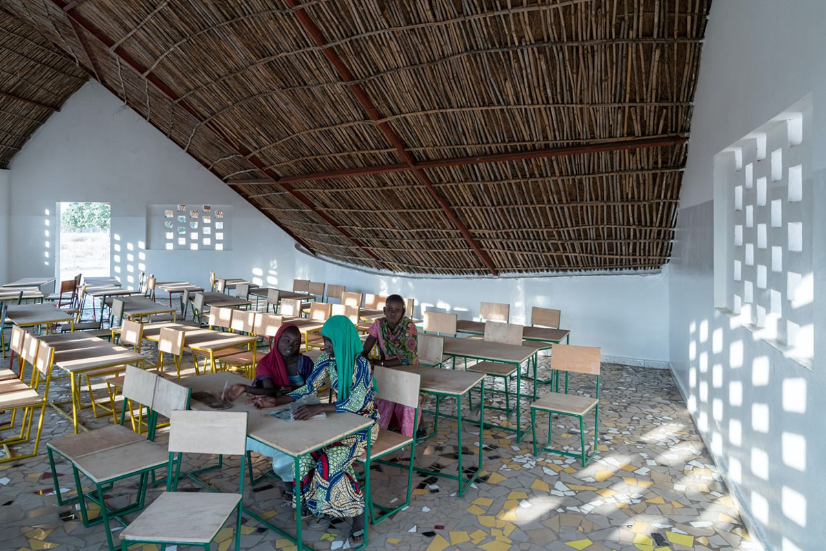 Toshiko Mori built Fass School and Teachers’ Residence featuring wavy thatched roof in remote Senegal