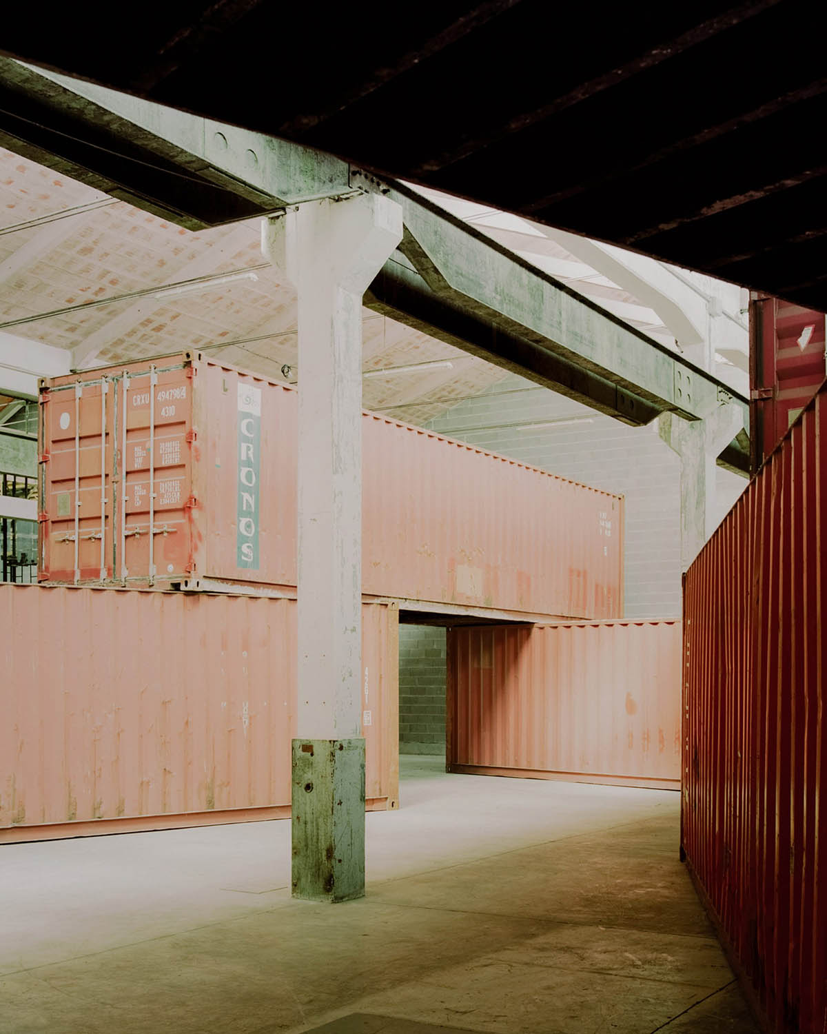 AMAA installs old shipping containers in a factory to facilitate the space with new functions