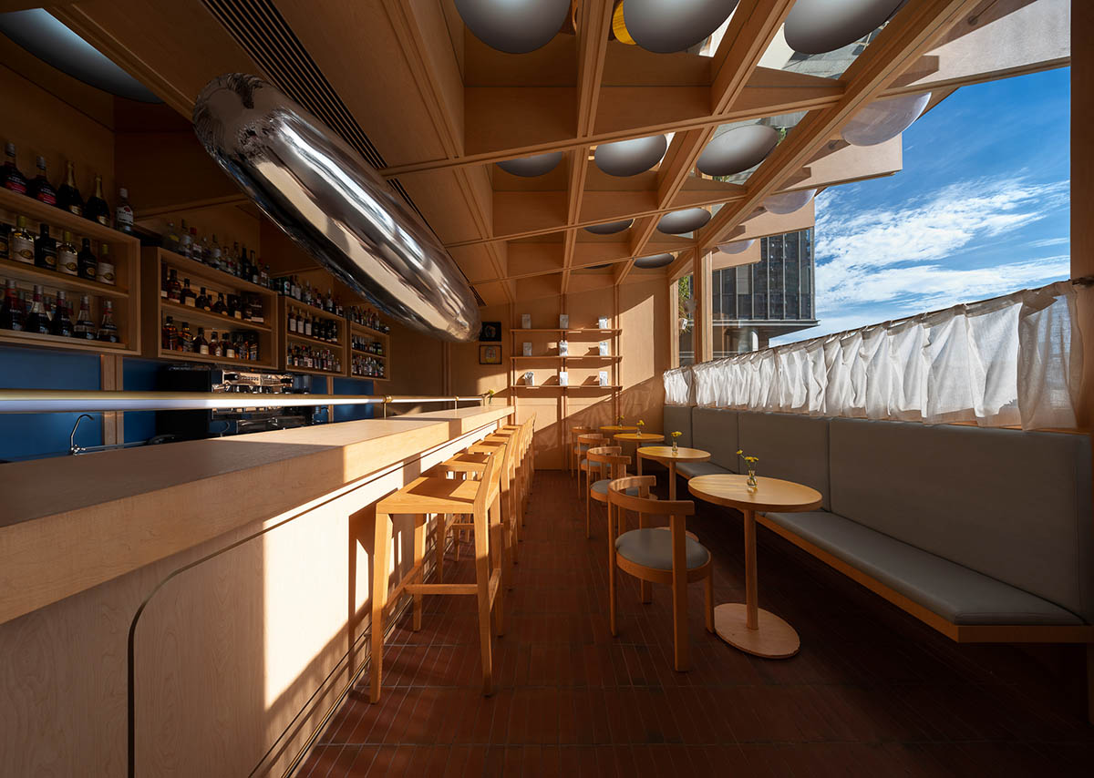 Various Associates completes C² Cafe & Bar in Shenzhen with wooden ceiling details