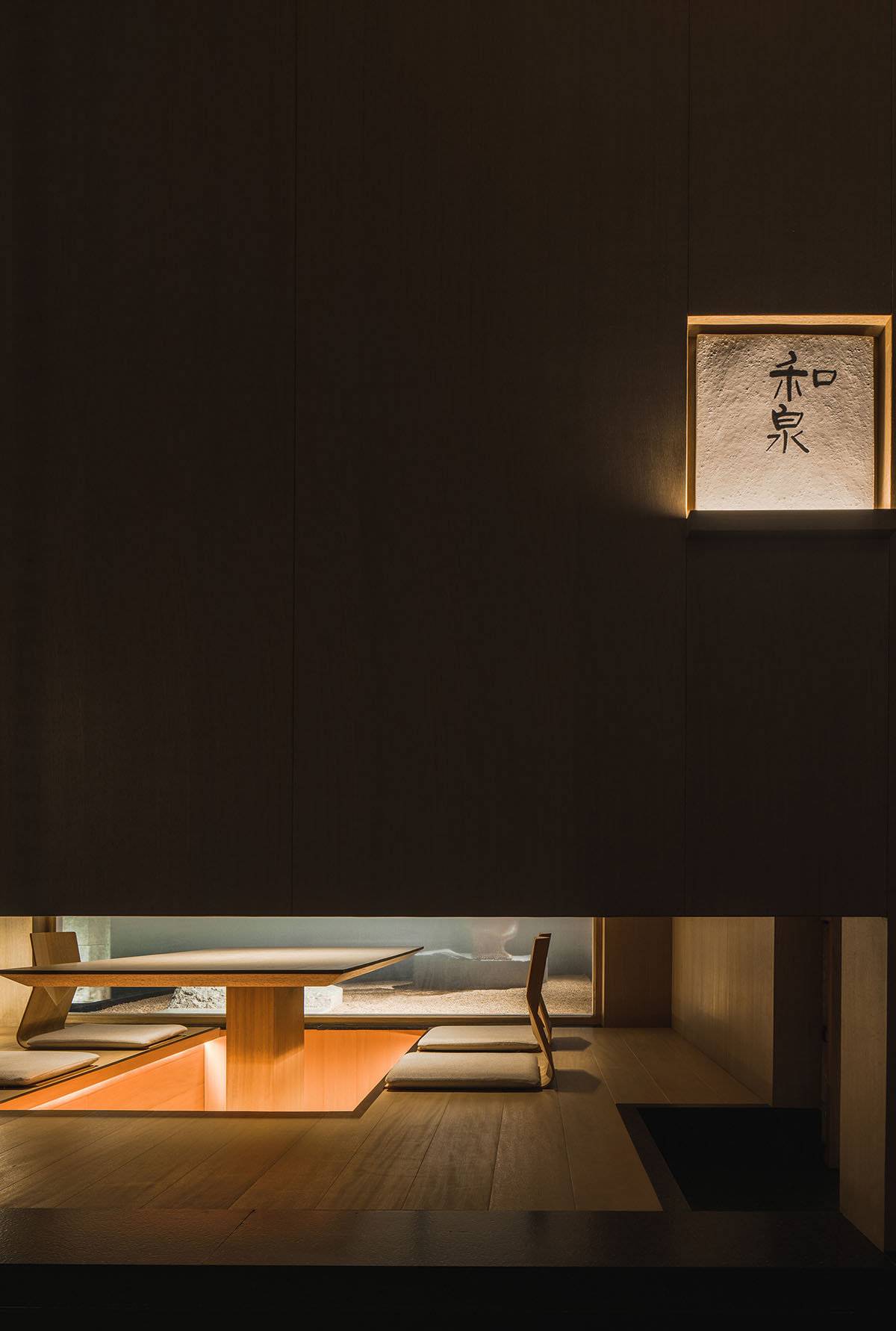 Nature Times Art Design creates tranquil dining space for Teng Restaurant in a sealed box form