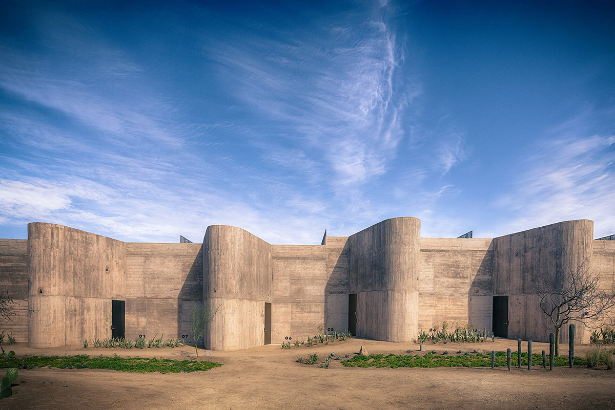 Resort mimics natural motion of desert with punctuated beige-coloured concrete volumes in Mexico 