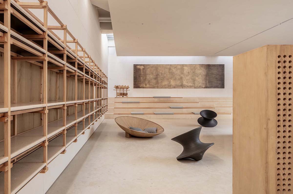 Waterfrom Design creates peaceful interior with wooden furnitures for tea community center in China