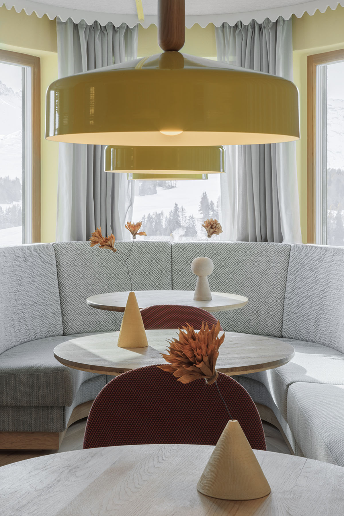 Icaro Hotel featuring wooden colonnade frames embraces alpine heritage landscape in Italy 