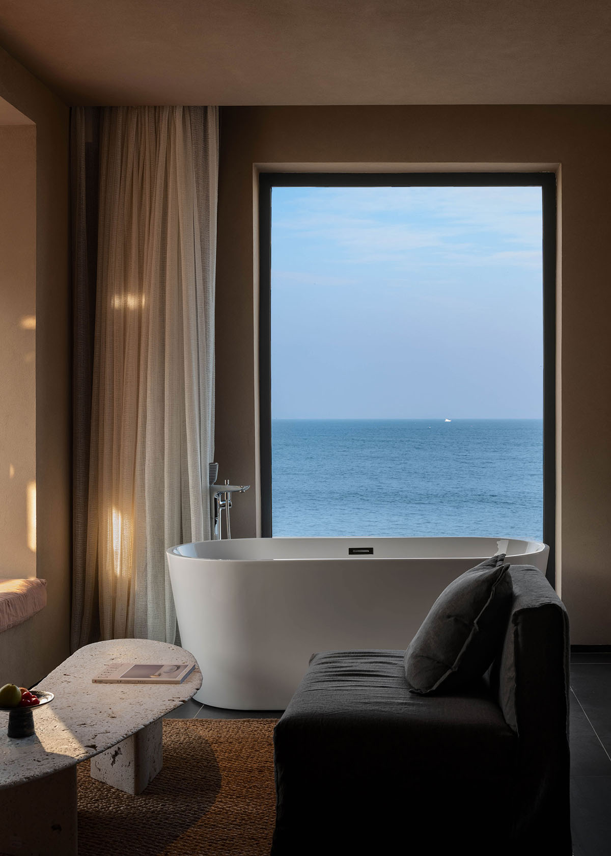 Fusion Design reveals seaside resort featuring red-colored and arched façade in Shenzhen