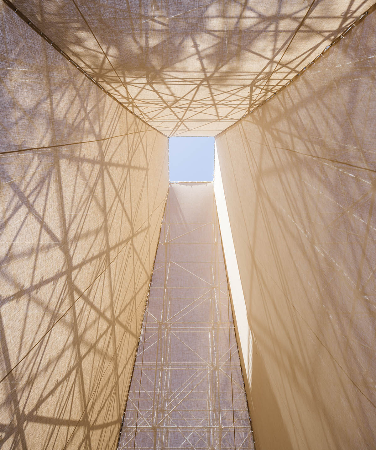 Aire Pavilion wrapped by giant scaffolding represents 