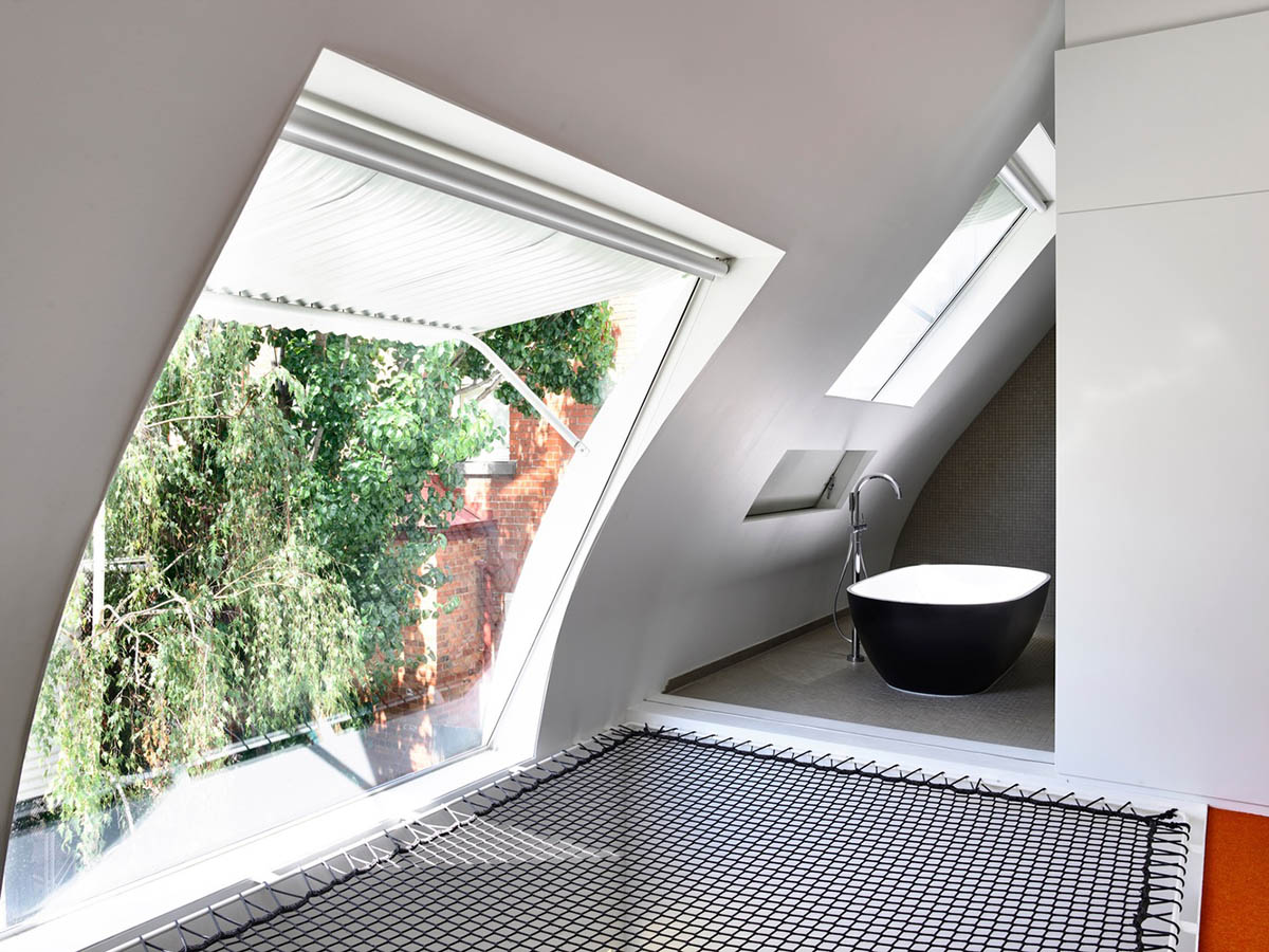 Austin Maynard Architects extends existing terraced home with corrugated steel pavilion