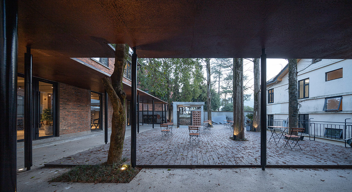 y.ad studio converts former hospital and old factory dormitories into homestay hotel in China