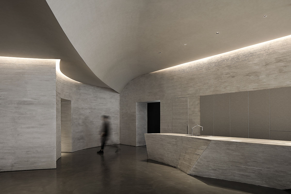 Waterfrom Design's art space features flowing walls to create