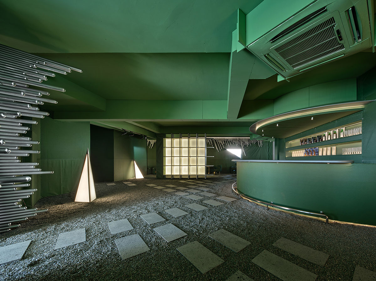 PIG DESIGN completes art space with recycled materials and green-colored furniture pieces in China 