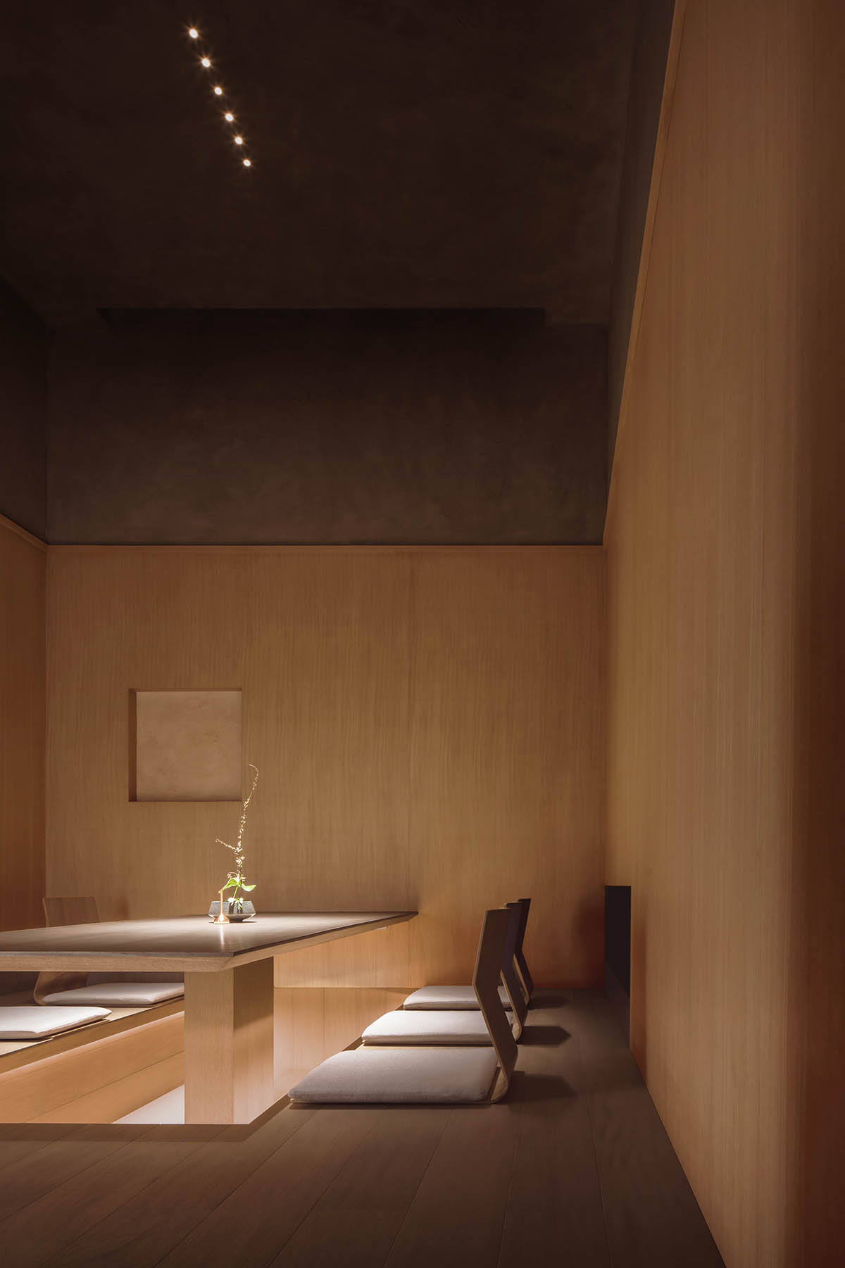 Nature Times Art Design creates tranquil dining space for Teng Restaurant in a sealed box form