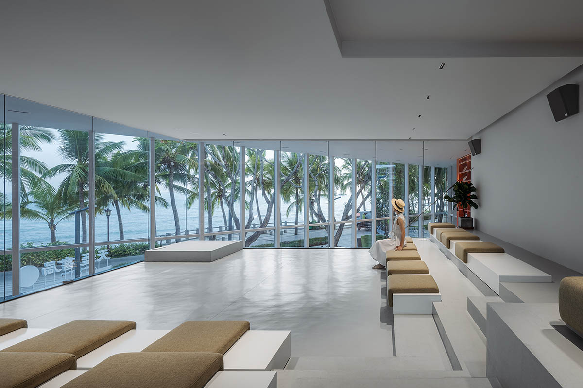 Wutopia Lab elaborates bookstore with red triangular bookshelves for Tianya Books in China 