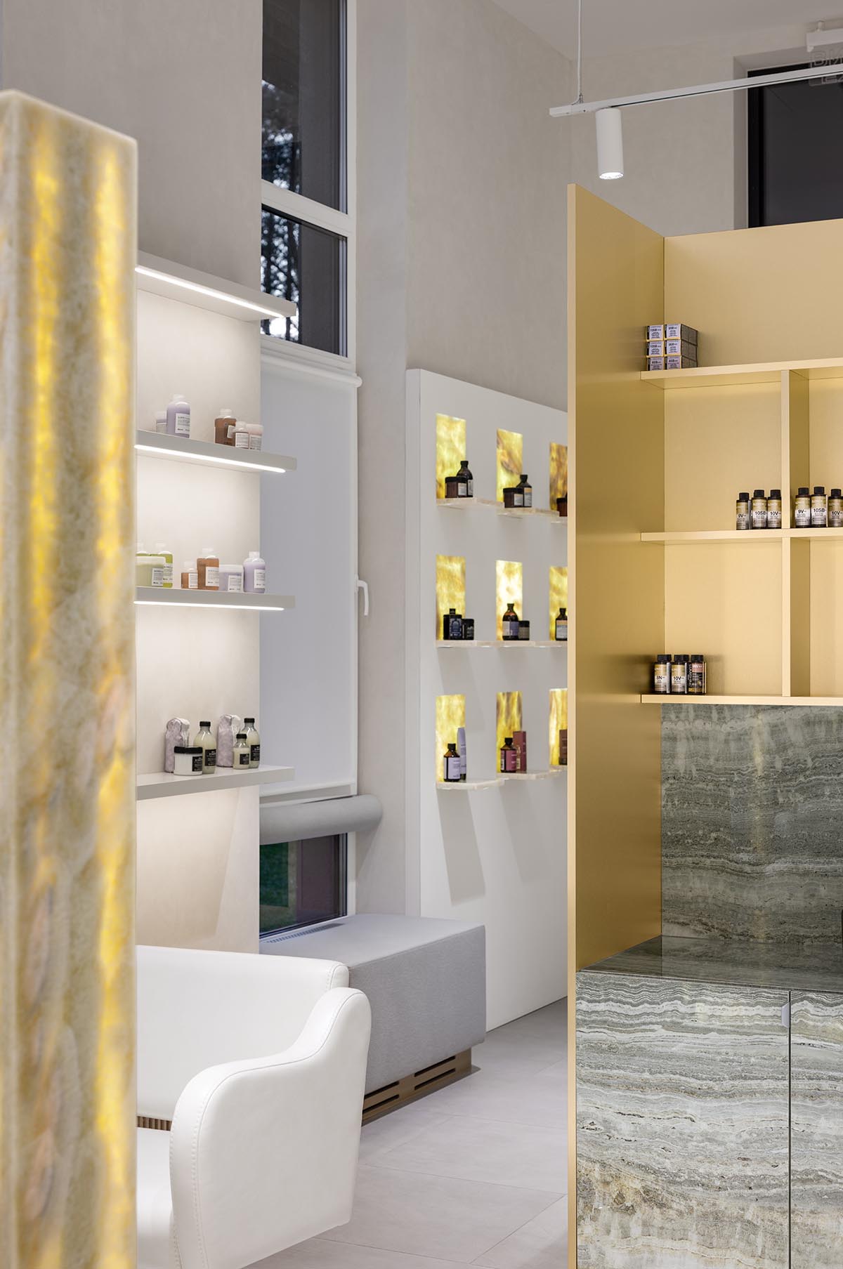 Mirrors and golden frames create a sense of care and deep comfort for beauty salon in Ukraine