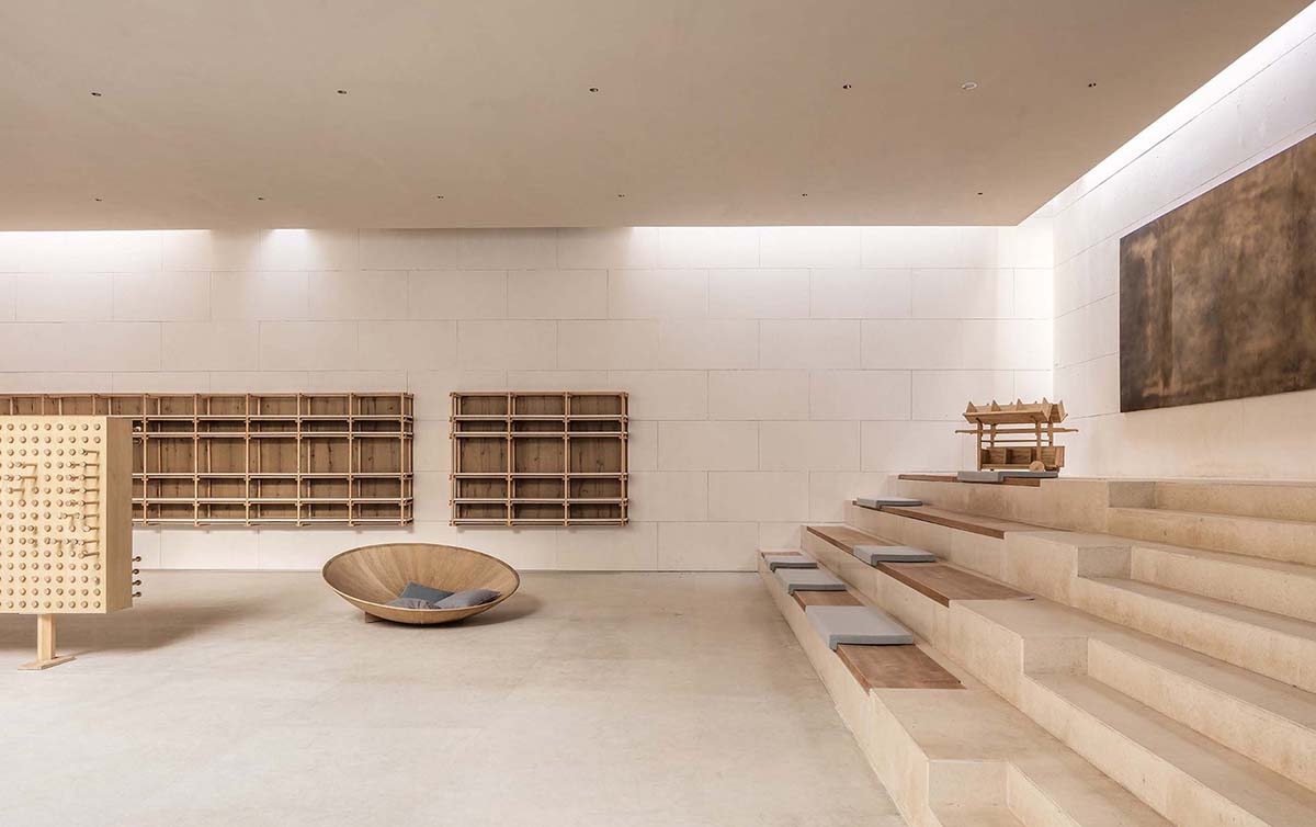 Waterfrom Design creates peaceful interior with wooden furnitures for tea community center in China