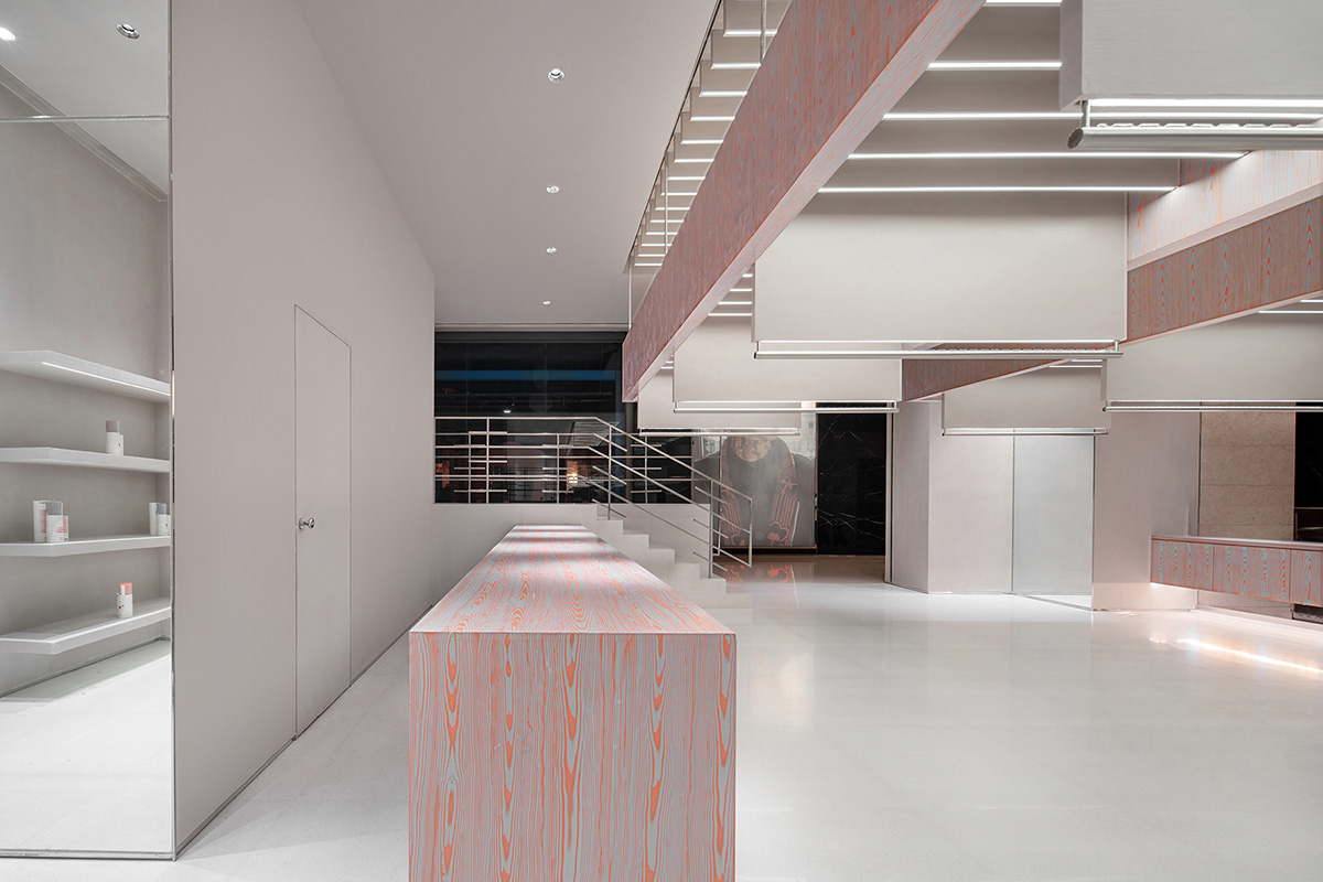 Various Associates creates show-like and pink-hued fashion store under a viaduct in Chongqing