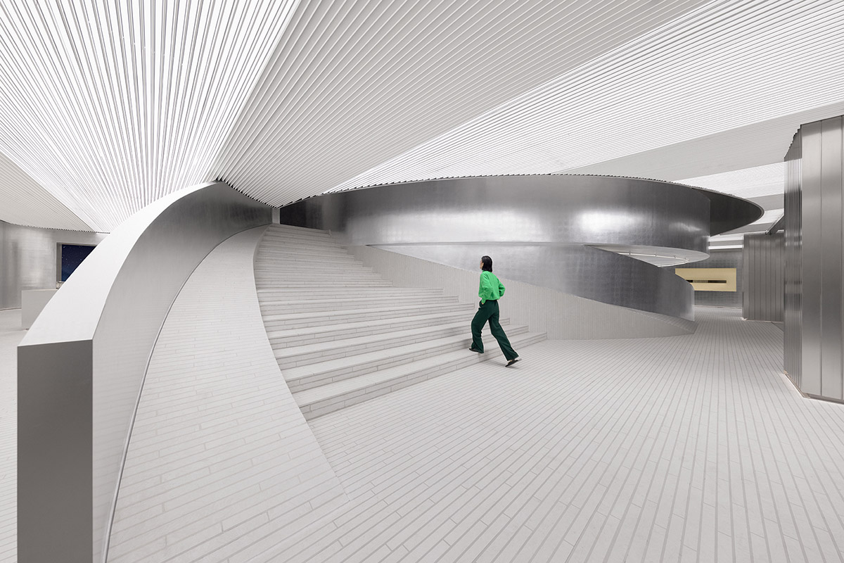 Various Associates designs beauty store with winding staircase and silver-toned interiors in Hangzhou