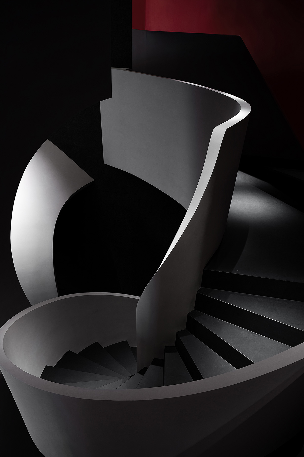 A beauty salon by AD ARCHITECTURE features dark-hued interiors drawing inspiration from cells