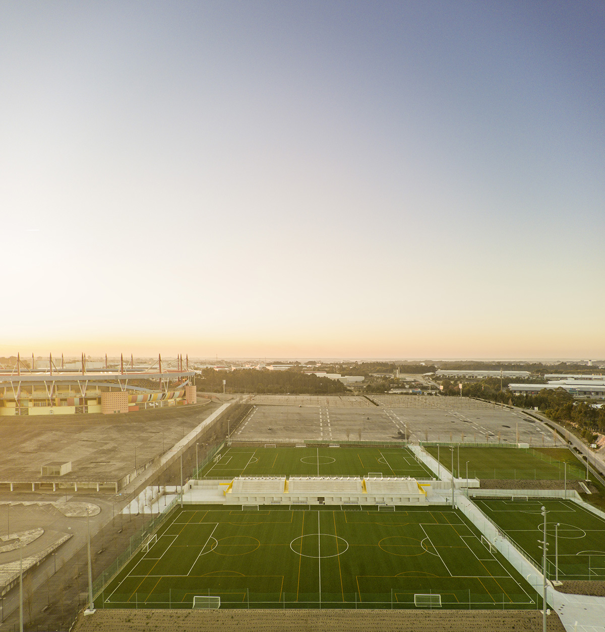 Summary highlights circulation and public areas of training facility of stadium with yellow color