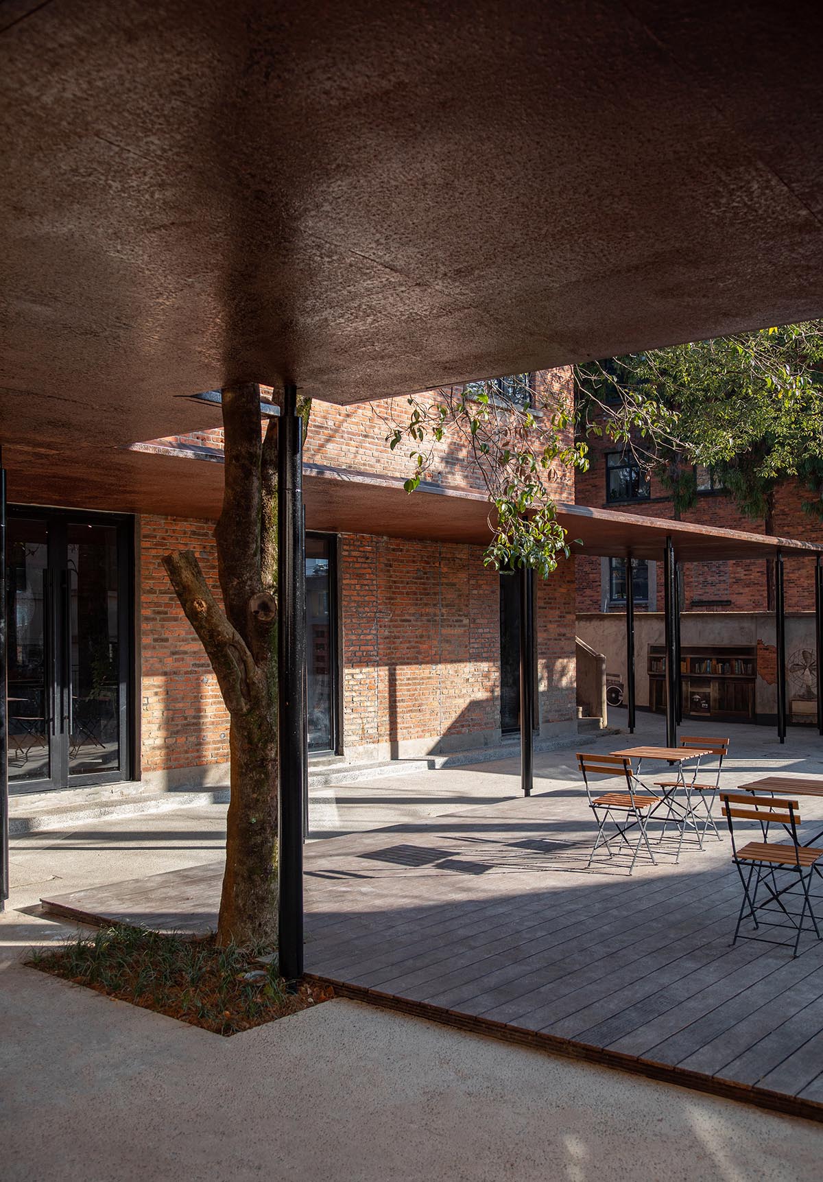 y.ad studio converts former hospital and old factory dormitories into homestay hotel in China