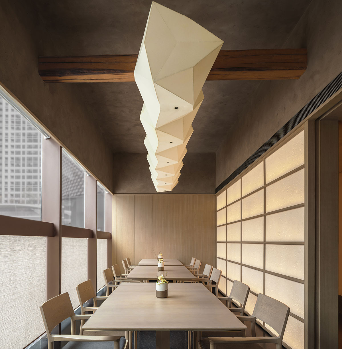 Nature Times Art Design creates tranquil dining space for Teng Restaurant in a sealed box form