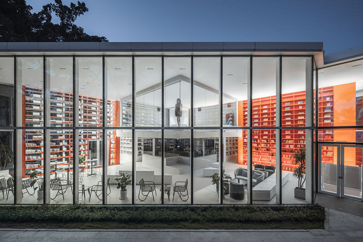 Wutopia Lab elaborates bookstore with red triangular bookshelves for Tianya Books in China 
