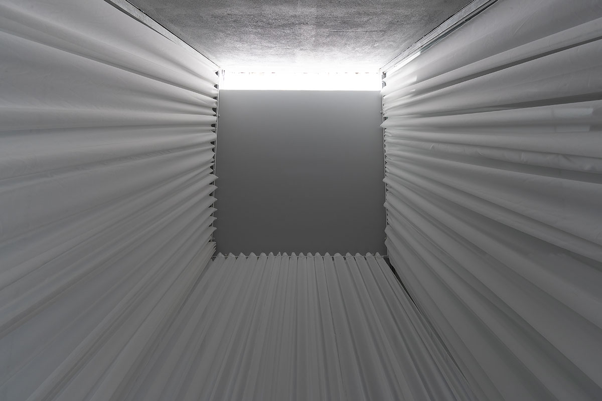 MIA Design Studio completes family house with angular roof in Vietnam 