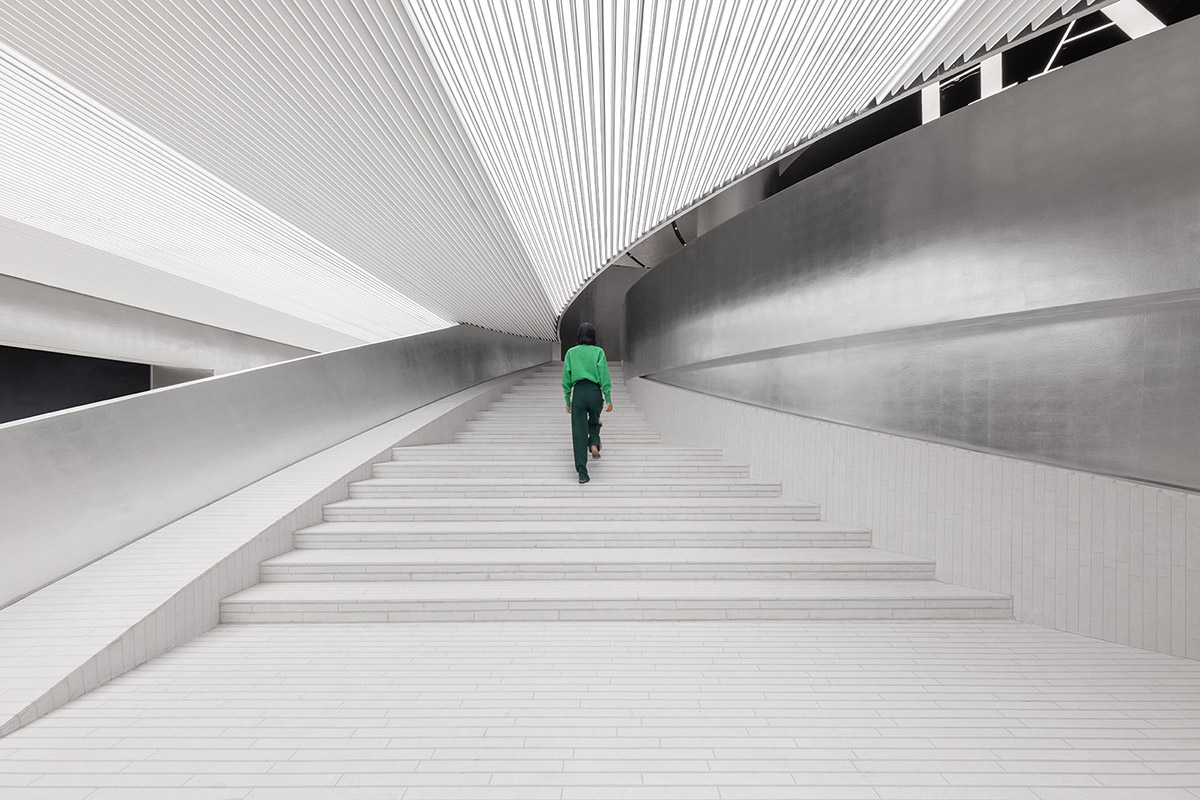 Various Associates designs beauty store with winding staircase and silver-toned interiors in Hangzhou