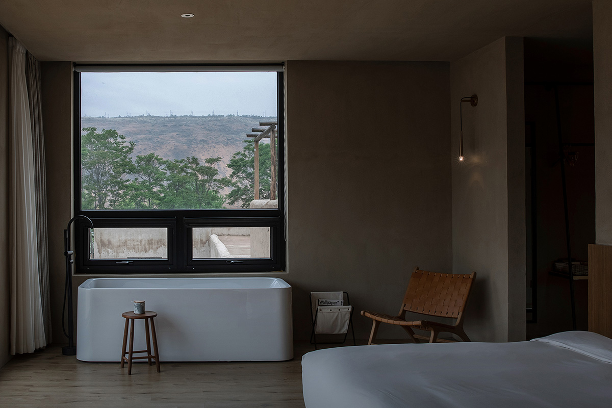 DAS Lab completes Lost Villa Boutique Hotel with earth-toned colours and smooth details in Ningxia