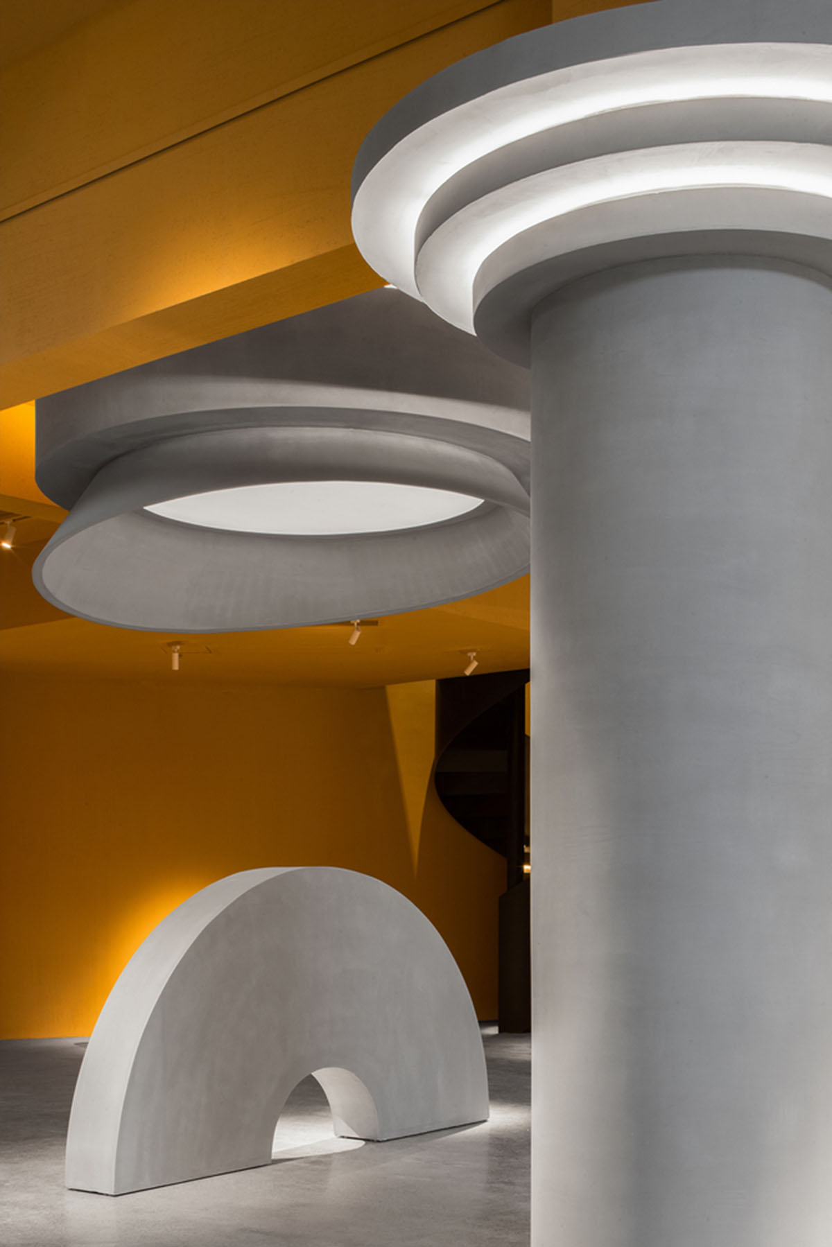 Angular corrugated stainless steel sheets form this showroom designed by PIG DESIGN in Hangzhou