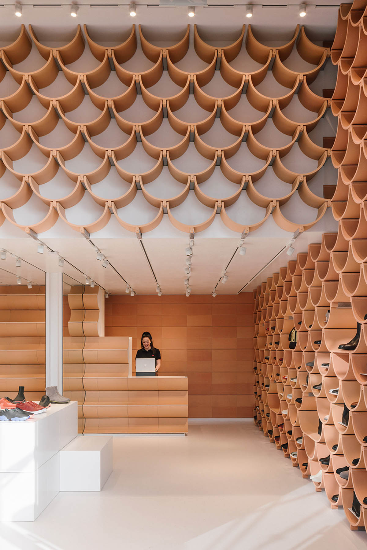 Kengo Kuma and Associates renovates Camper’s first shop in Barcelona with vault-shaped ceramic plates