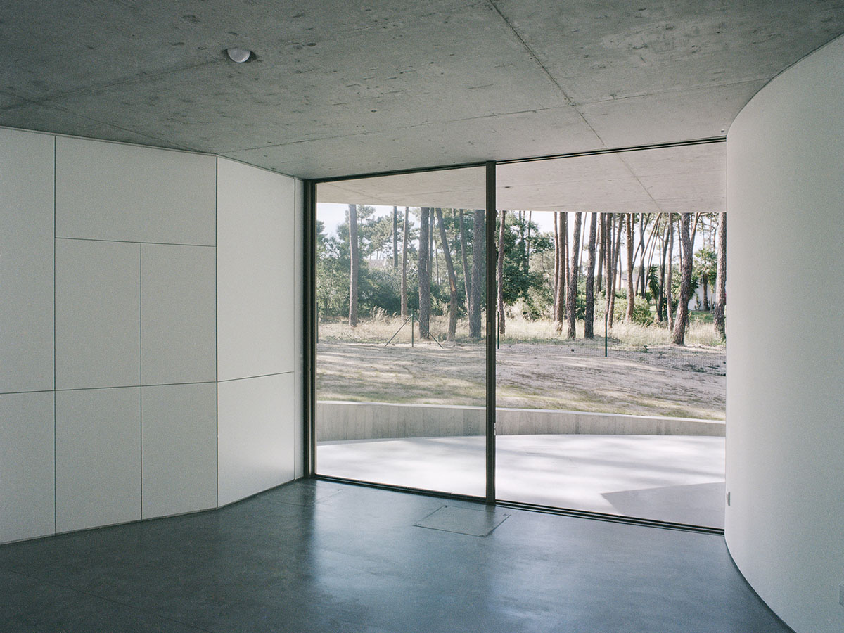 Double(o) Studio built Trefoil House with circular and hexagonal layout merged in one massing