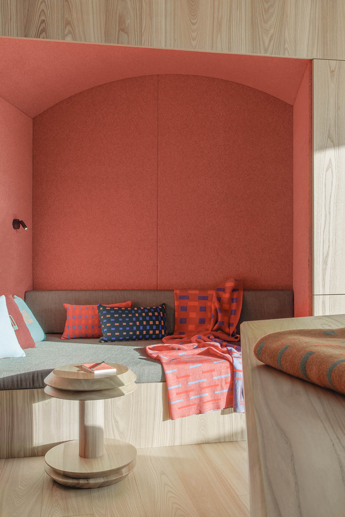 Icaro Hotel featuring wooden colonnade frames embraces alpine heritage landscape in Italy 