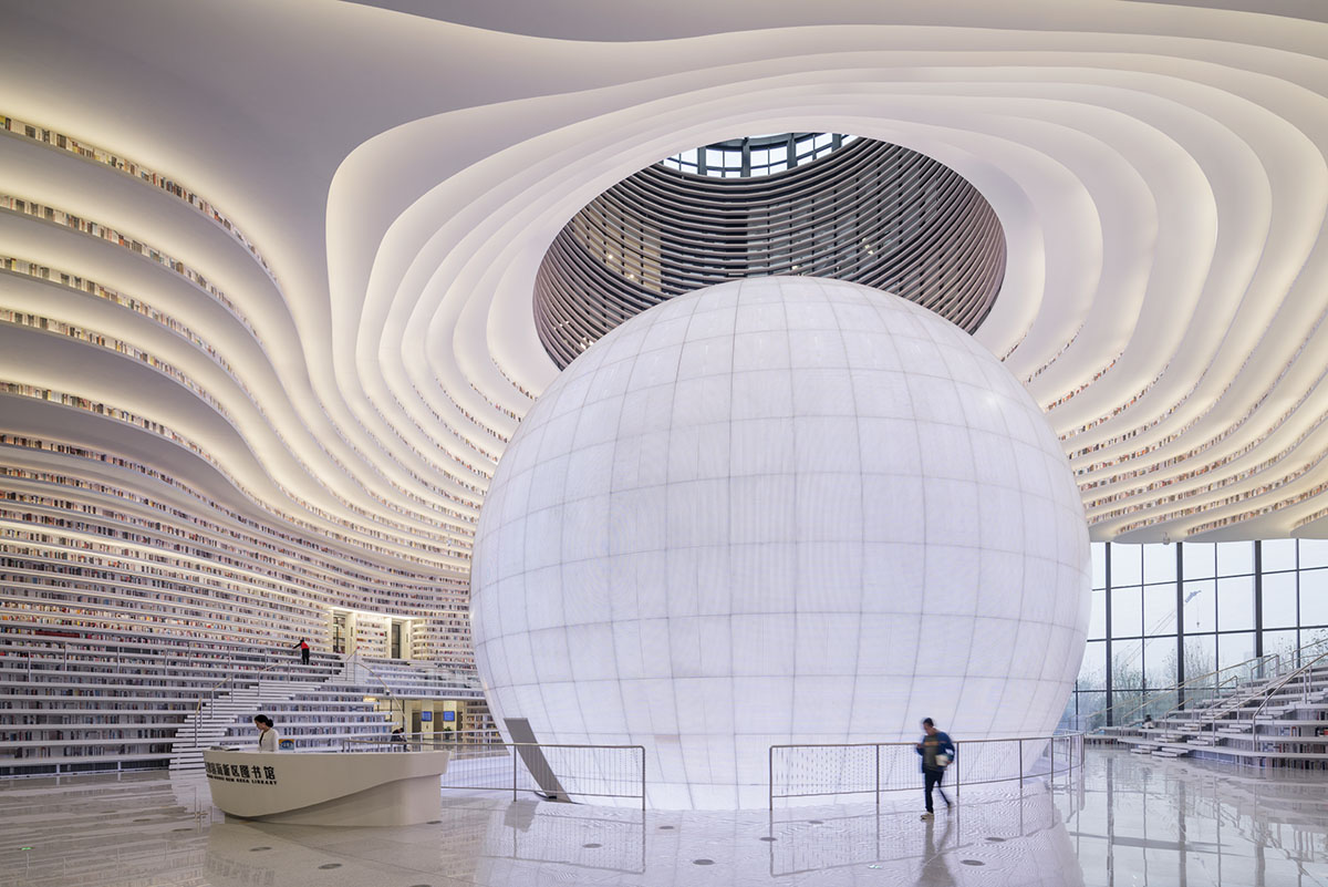 MVRDV’s topographical Tianjin Binhai Public Library featuring millions of books opens in China