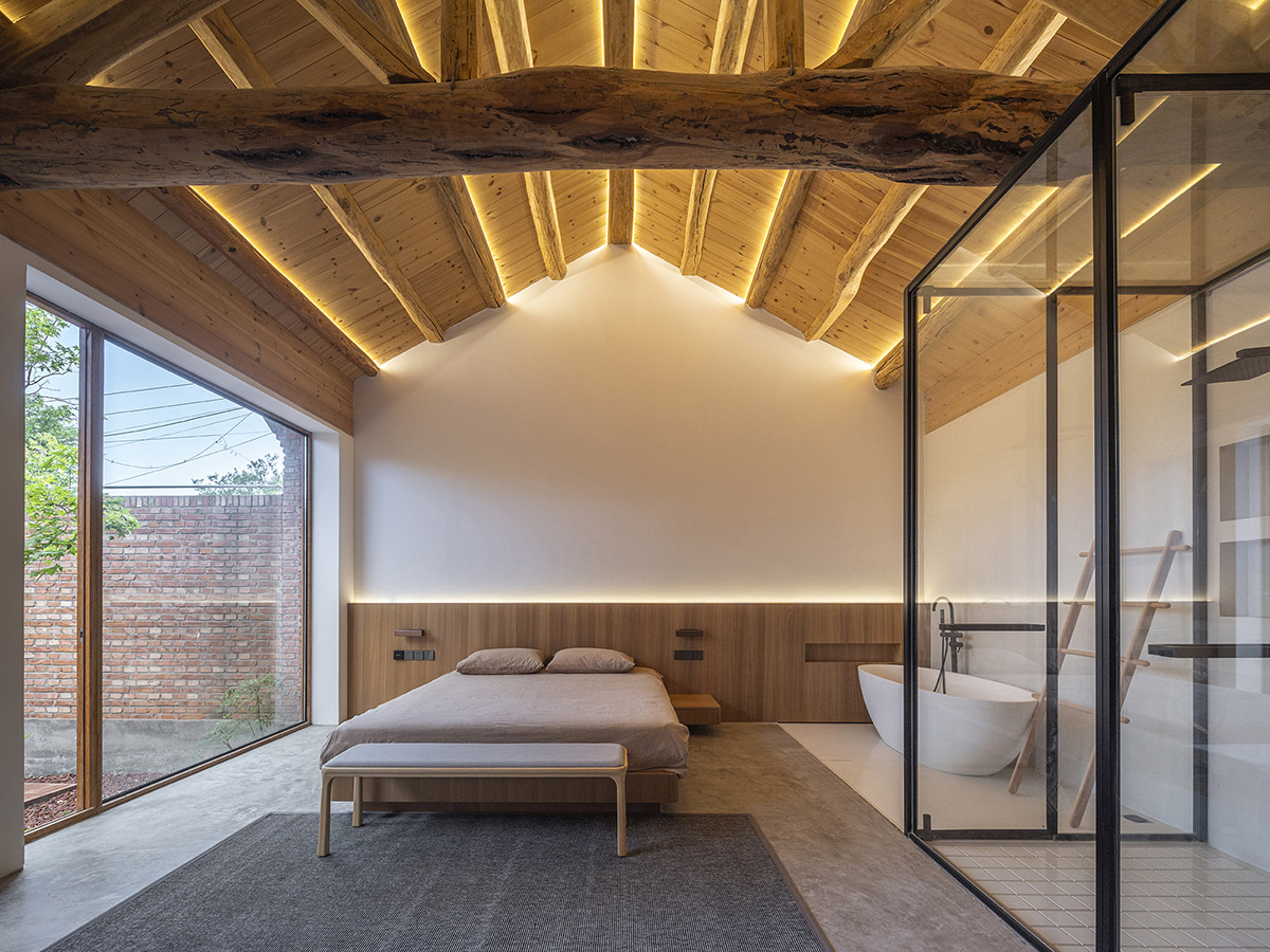 Archstudio renovates Beijing's old courtyard house with new wooden additions 