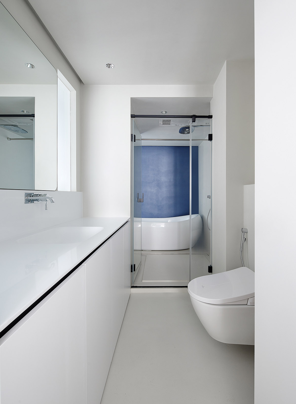 XIGO STUDIO creates gray and blue-colored interiors for apartment in Beijing 