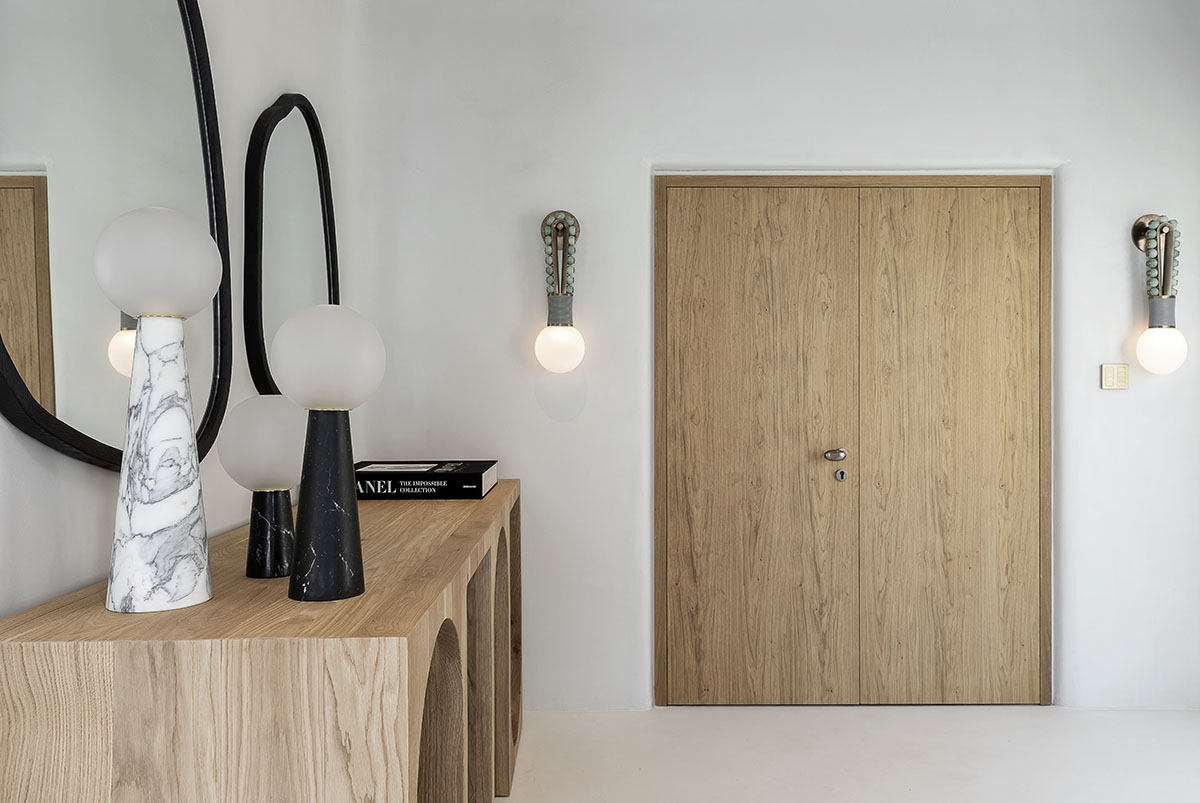 MK Design Studio designs luxurious holiday villa with creamy white walls and stone-walled terraces