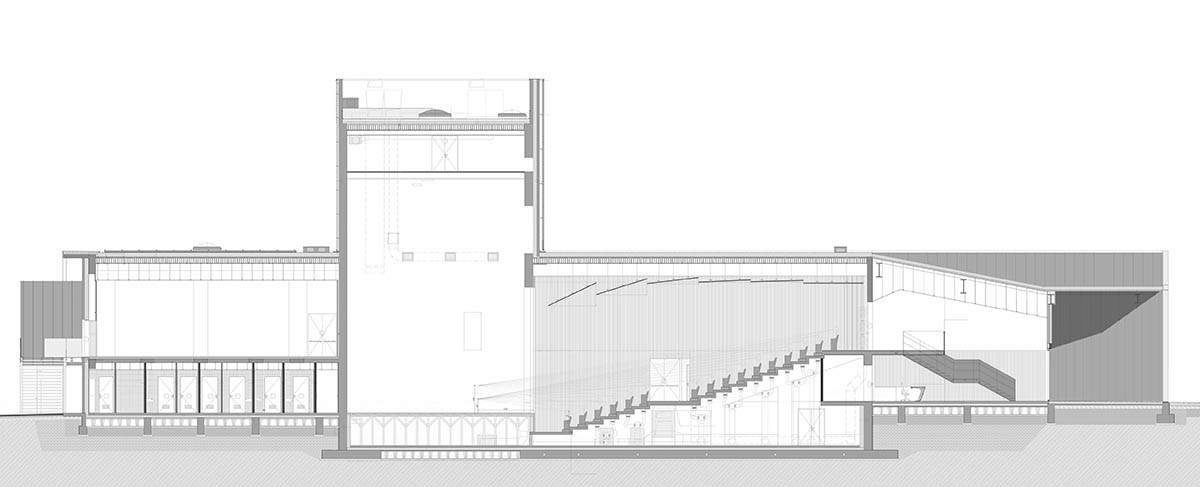 Teatro Borsoni theater is wrapped by façades that feature 3D-punctuated concrete blocks in Italy