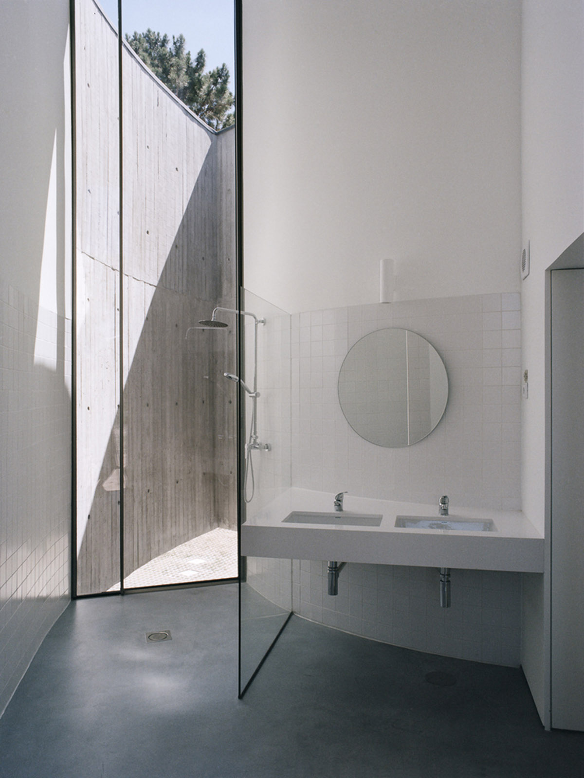 Double(o) Studio built Trefoil House with circular and hexagonal layout merged in one massing