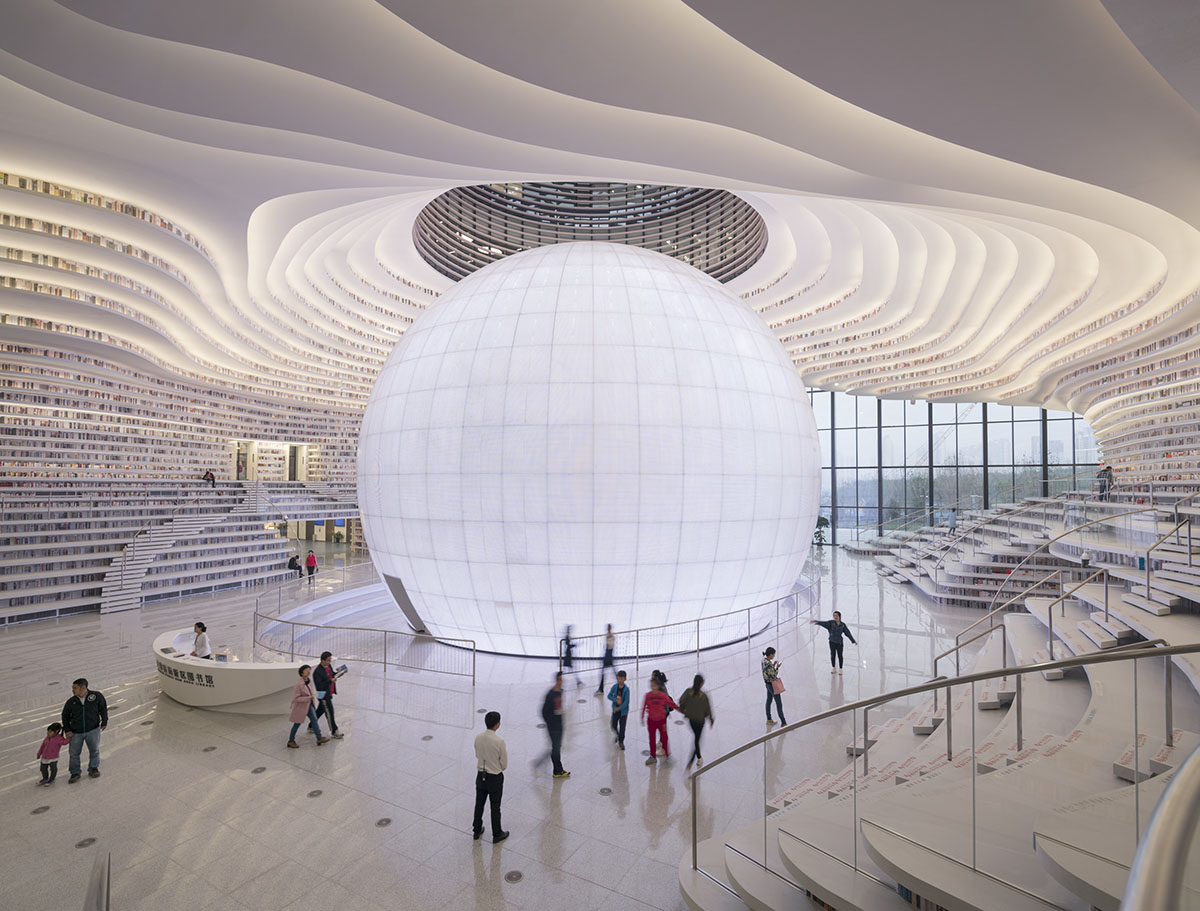 MVRDV’s topographical Tianjin Binhai Public Library featuring millions of books opens in China