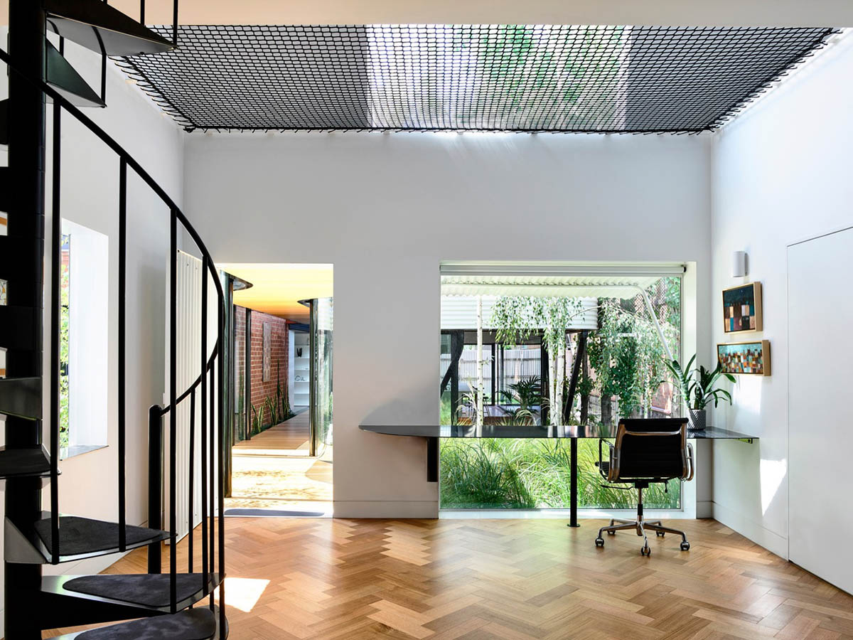 Austin Maynard Architects extends existing terraced home with corrugated steel pavilion