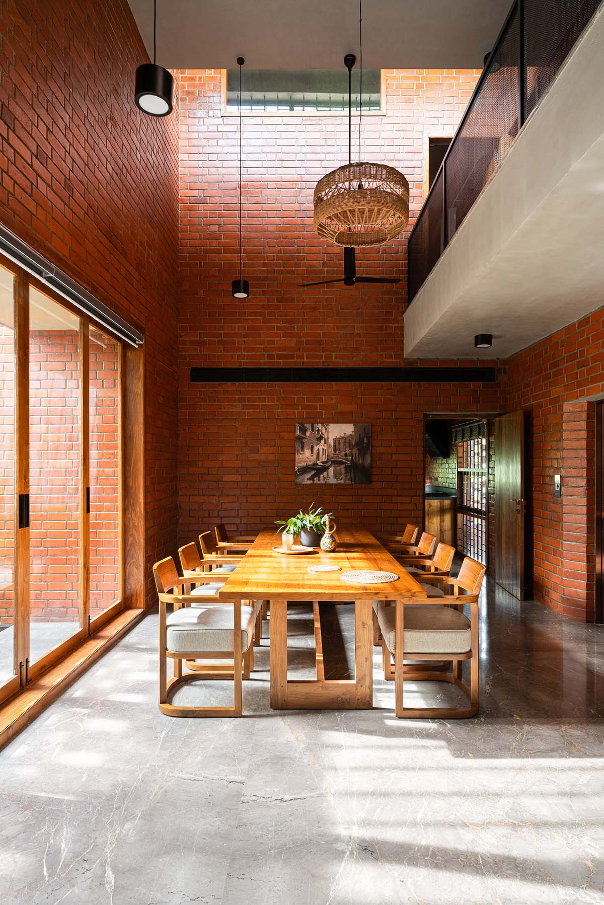 Srijit Srinivas - ARCHITECTS built brick family house with angled triangular façade in Kerala