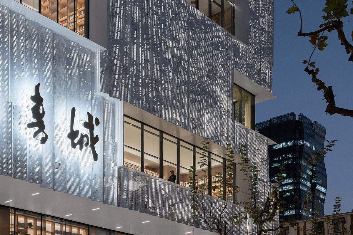 Shanghai Book City by Wutopia Lab clad in perforated metal panels giving a dazzling effect