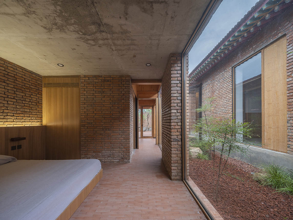 Archstudio renovates Beijing's old courtyard house with new wooden additions 