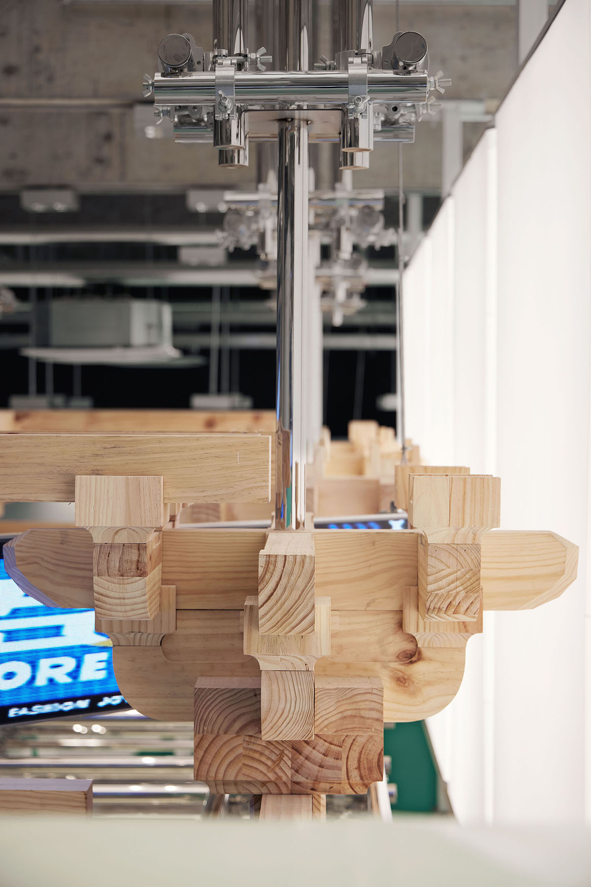 BloomDesign combines stainless steel tubes with timber joints to create retail store in China 