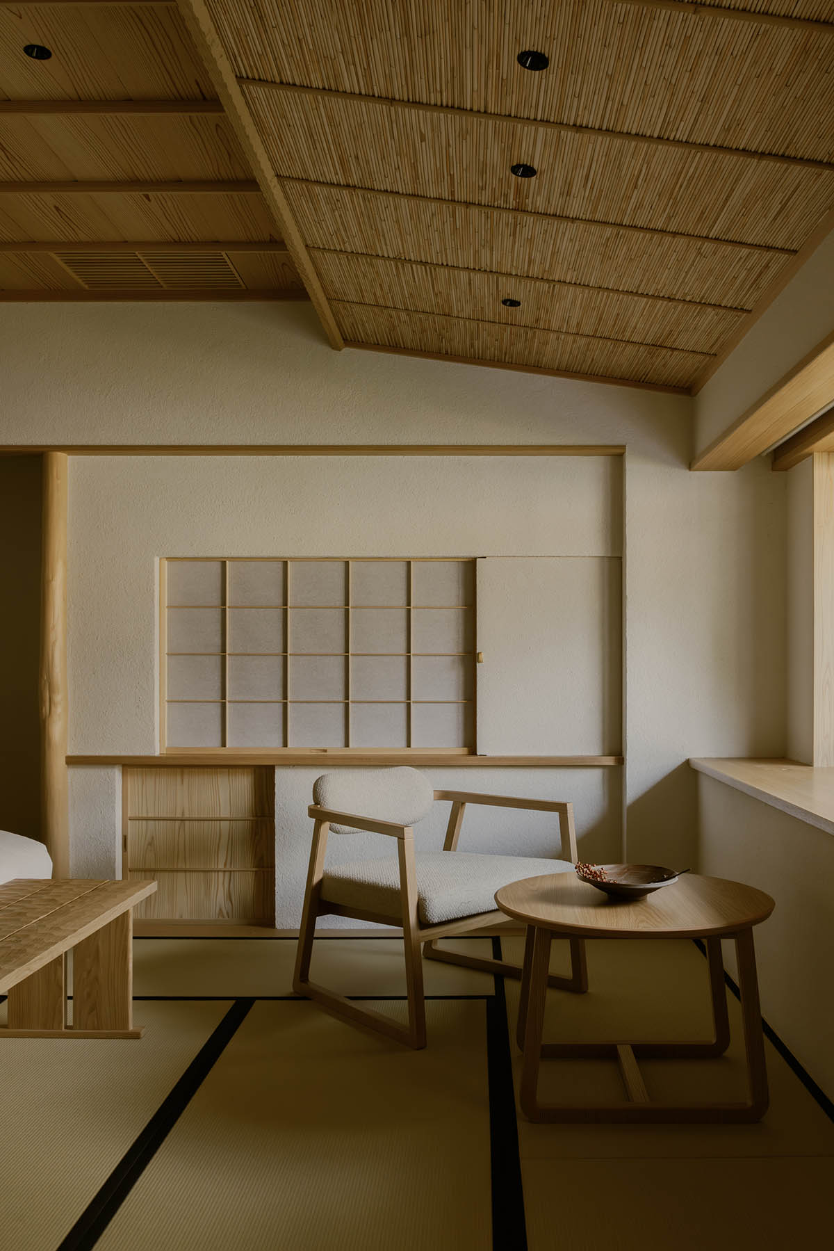 kooo architects creates a wooden interior sanctuary for contemporary accommodation in Kyoto City