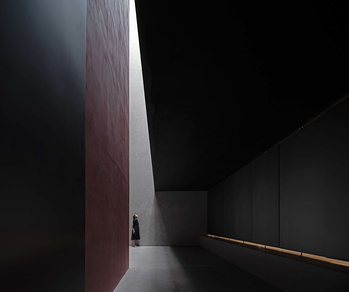 AD ARCHITECTURE creates dark interiors for showroom playing with light and sharp geometries in Foshan